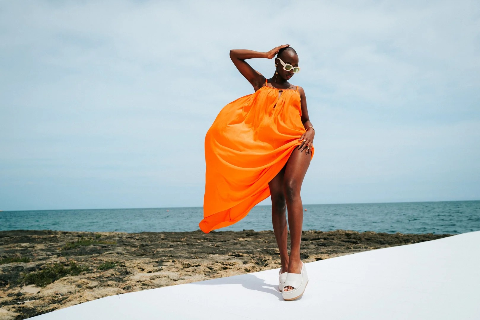 Puglia coastline at golden hour — NARS Afterglow